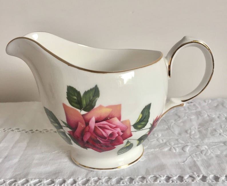 Vintage Crown Essex charlotte milk jug and sugar bowl.