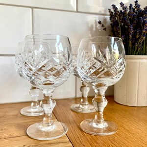 Set of 4 vintage faceted wine glasses.