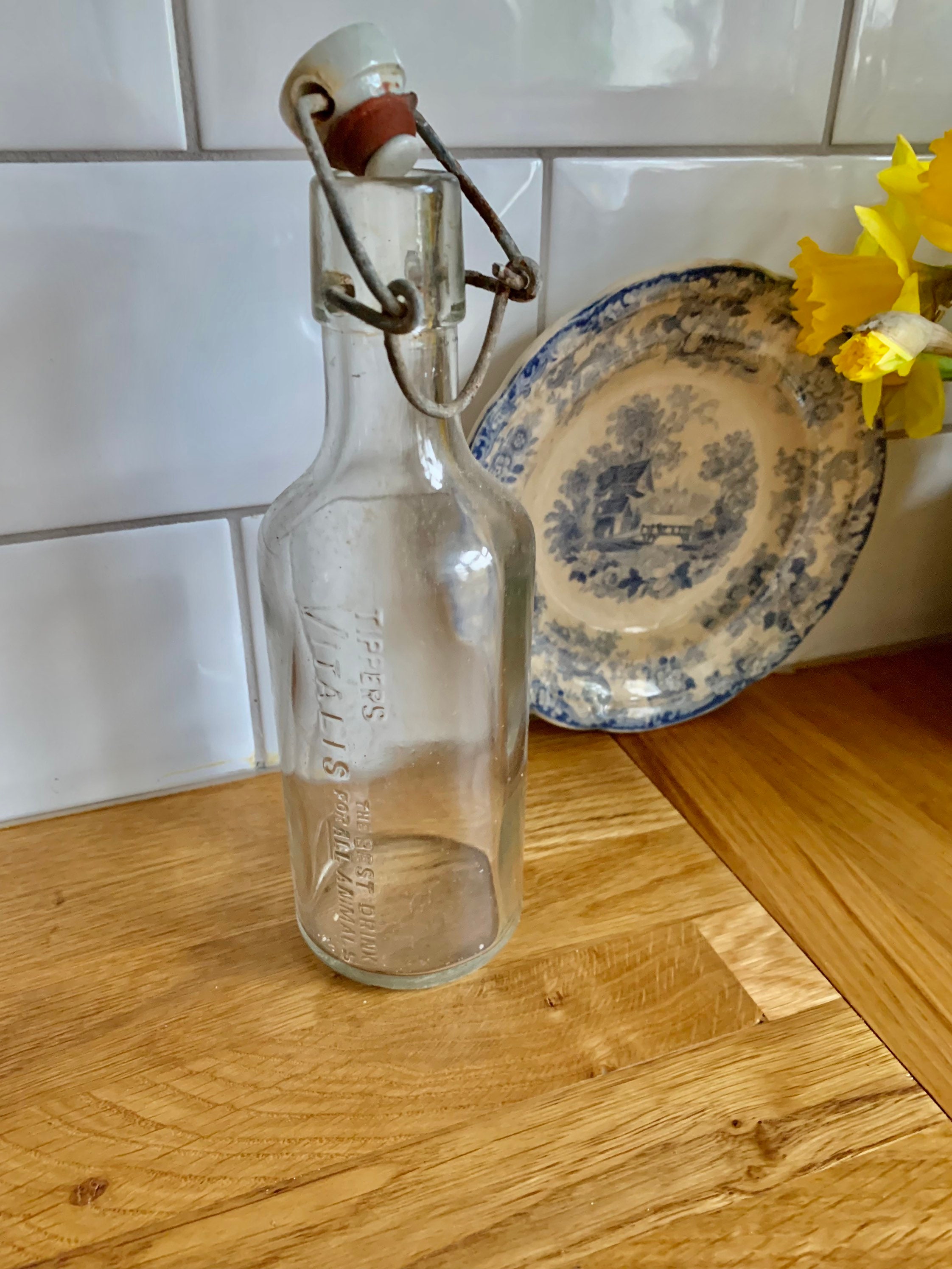 Antique clear glass vitamin bottle. Vitalis. Stoppered bottle.
