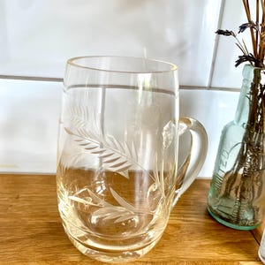 Fabulous vintage etched glass tankard.