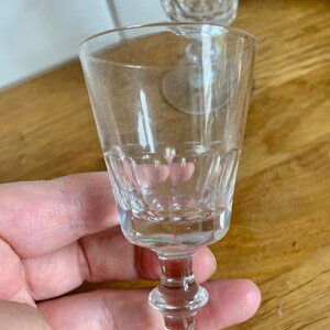 Set of 2 vintage faceted sherry glasses.