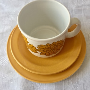 Retro 1970&#39;s tea cup, saucer and tea plate trio. Gorgeous yellow