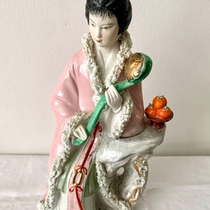 Vintage porcelain Chinese lady.