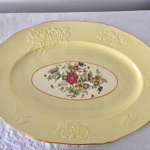 Gorgeous vintage Royal Doulton yellow platter.