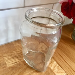 Antique clear glass bottle.