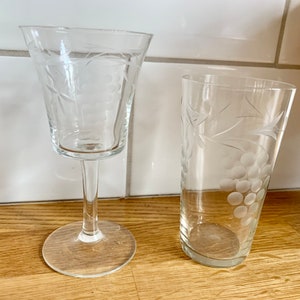 Set of 2 vintage etched wine glasses.
