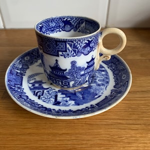 Antique royal Worcester willow demitasse cup.