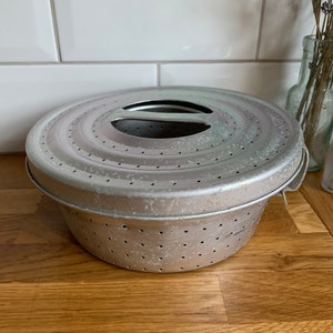 Vintage aluminium steamed pudding pot.