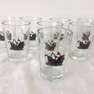 Vintage 8 shot glasses. Decorated with ships