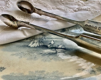 Vintage EPNS Sugar tongs.