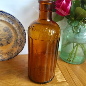 Antike braune Giftflasche aus Glas.