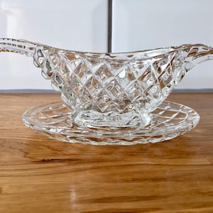 lead crystal sauce boat with tray.