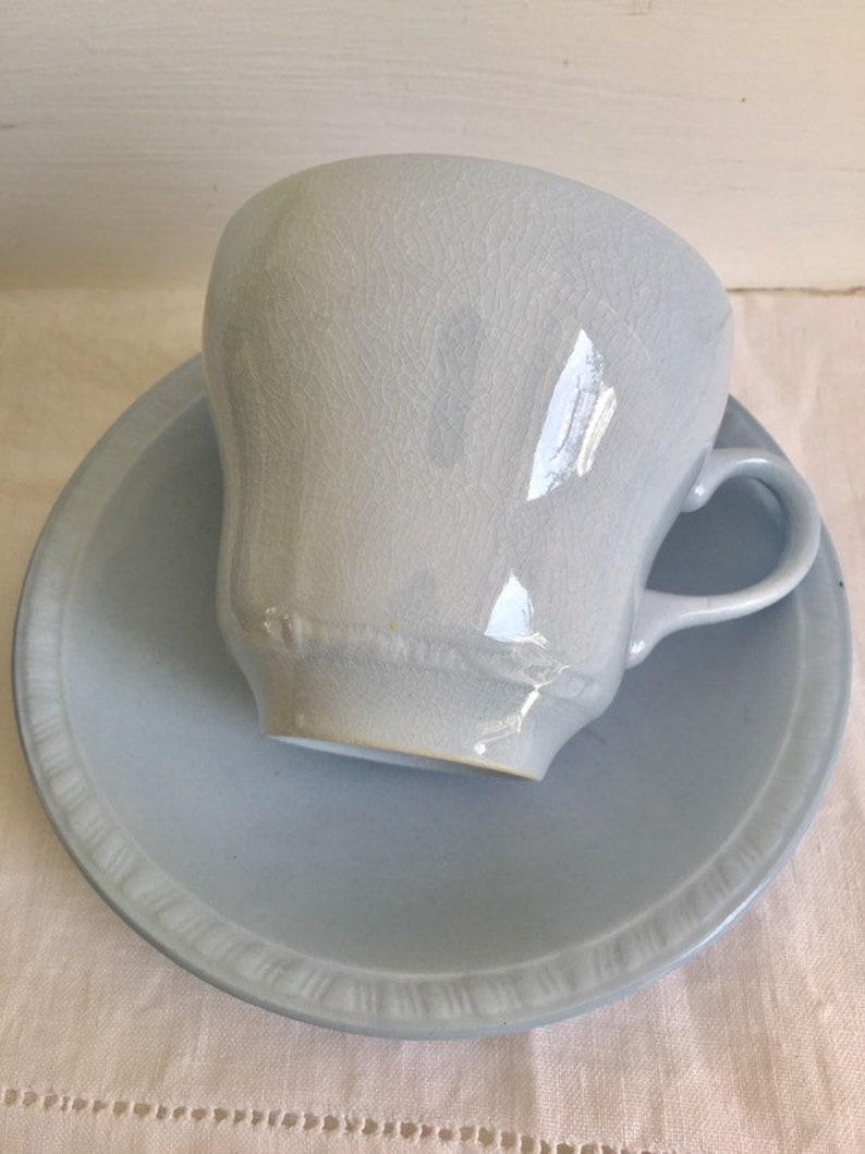 vintage pastel ware tea cup and saucer Utilitarian ware.
