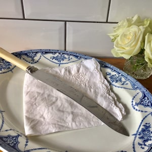 Fine large vintage bread or carving knife with resin handle.