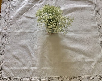 Vintage cotton crochet edged decorative tablecloth.