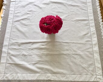 Vintage cotton crochet edged decorative tablecloth.