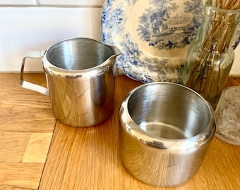 Vintage  stainless steel milk jug and sugar bowl.