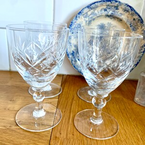 Set of 4 vintage faceted wine glasses.