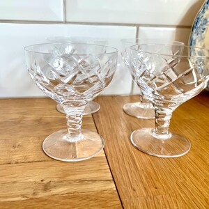 Set of 4 vintage faceted wine glasses.
