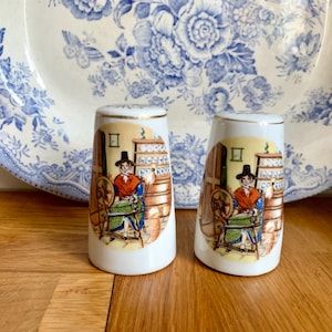 Vintage kitsch Welsh salt and pepper shakers.
