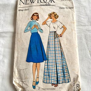 May include: Vintage New Look sewing pattern for a wrap skirt, sizes 10-18. The pattern features illustrations of two skirt styles, with the text "Easy To Sew" and "Wrap Skirt". The pattern is on a cream-colored paper.