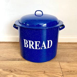 Vintage blue speckled enamel bread bin.