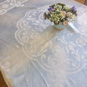 vintage blue and white damask tablecloth.