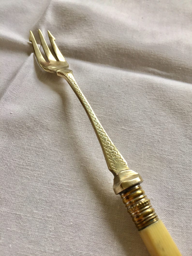 Vintage EPNS resin handled pickle fork Vintage fork