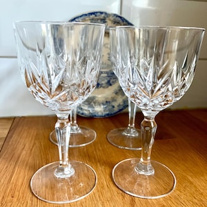 Set of 4 vintage faceted wine glasses.