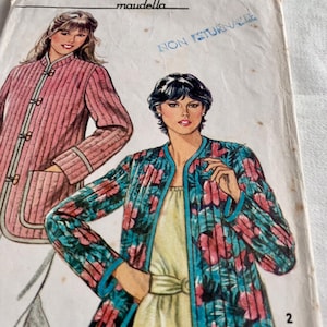 May include: Vintage New Look sewing pattern with illustrations of quilted jackets. The pattern cover shows a pink jacket with vertical stripes and a floral print jacket with turquoise trim. The text "NEW LOOK" and "maudella" are visible.