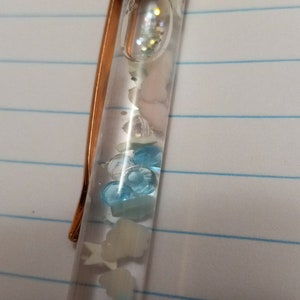 Unique rose gold stars and clouds snowglobe pen