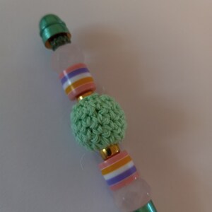Cute Spring planner pen with crochet focal bead and rose quartz beads