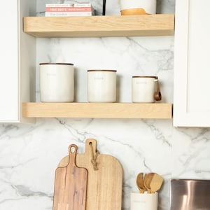 White oak floating shelves in a kitchen.