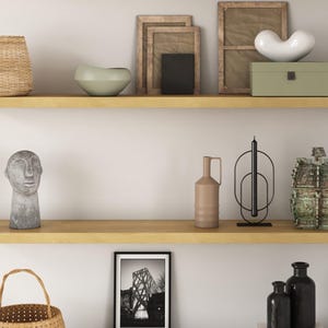 two white oak floating shelves in the living room.