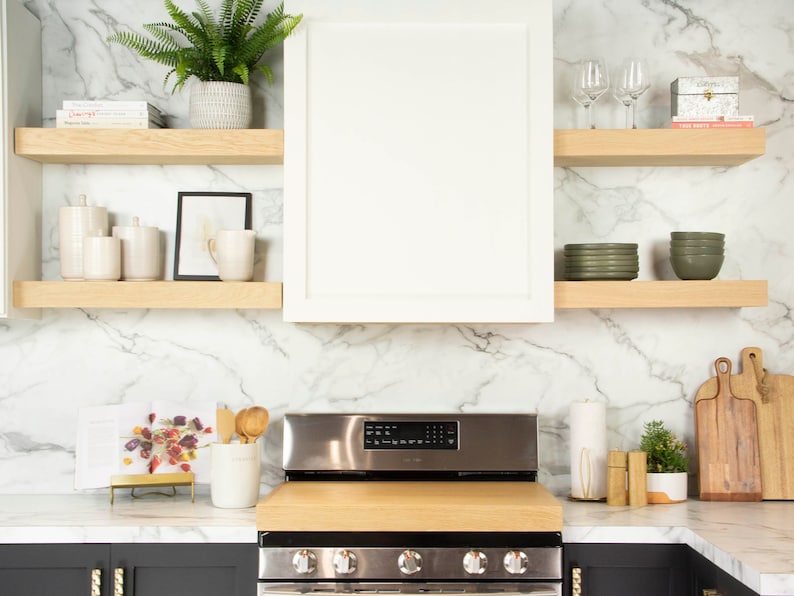 White oak floating shelves in a kitchen.