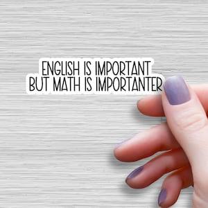 May include: White sticker with black text that reads "English is important but math is importanter".
