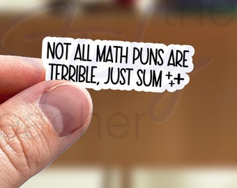May include: White sticker with black text that reads "Not all math puns are terrible, just sum ++".