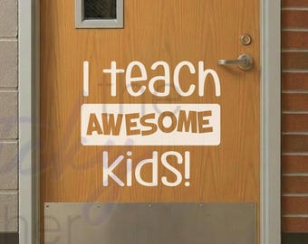 May include: A wooden classroom door with a vertical rectangular window and a silver metal kick plate. The door features a decal of a smiling sun and cloud, and the white text reads: I teach AWESOME KIDS! The door is labeled with the number 104.