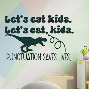 May include: A green dinosaur silhouette with a tail that forms a question mark. The text "Let's eat kids. Let's eat, kids. PUNCTUATION SAVES LIVES." is written in a retro font.
