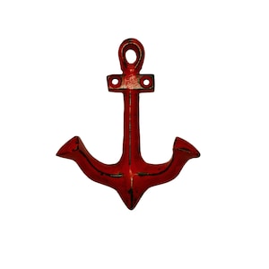 May include: Red metal anchor hook. This nautical-themed hook is perfect for hanging keys, towels, or other items in a bathroom, kitchen, or entryway.