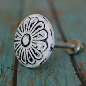 Round Metal Cabinet Knob With Floral Pattern in Distressed Finish