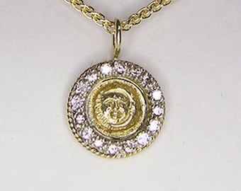 Tiny Cosmos in 18 kt. gold with Diamonds
