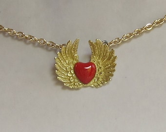 Queen of hearts with red enamel heart