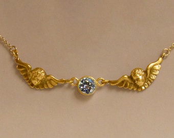 Little cherubs. 2 gold Puta's laughing with diamond.