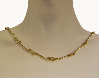Asymmetrical neckless original, radical and incredible.