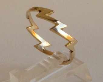 Wedding ring, lightning and a storm on your finger