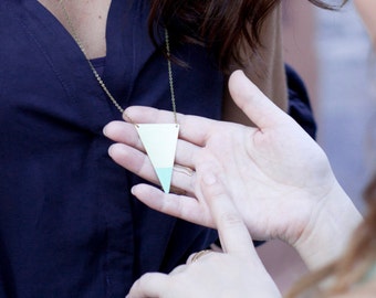 TRIANGLE. Enameled brass. Modern jewelry.