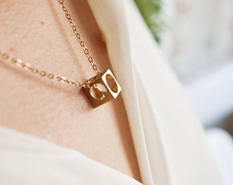 Minimalist tiny necklace. PERFORED SMALL CUBE. Simple and modern necklace to wear everyday.