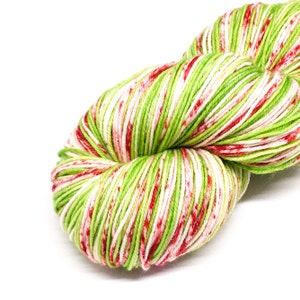 Elf Got a Papercut Christmas hand dyed yarn, variegated speckled sock yarn, 4 ply merino