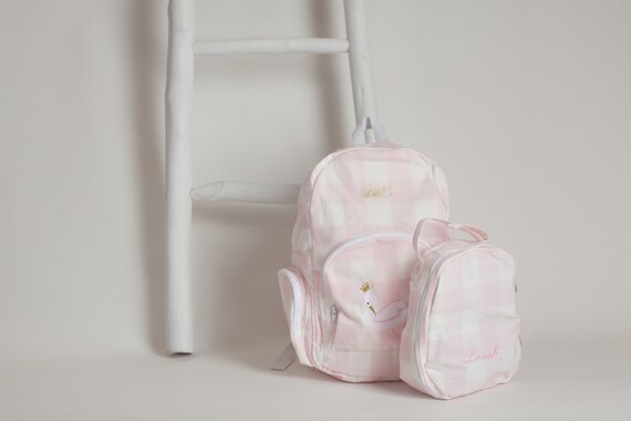 pink and white checkered backpack